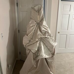 Luxurious Ivory Wedding Gown with Silver Accents